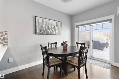 Dining space with baseboards and dark wood-type flooring - 56 Durrand Bend, Fort Saskatchewan, AB - Indoor Photo Showing Dining Room