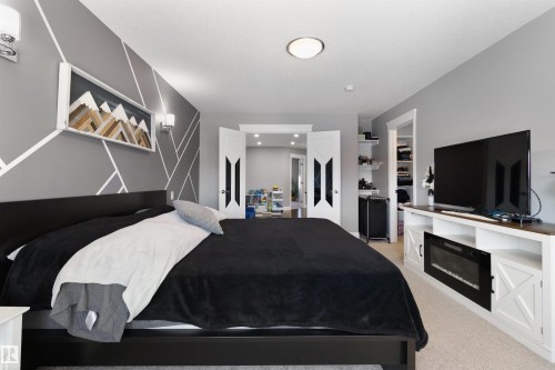 Bedroom with light colored carpet - 56 Durrand Bend, Fort Saskatchewan, AB - Indoor Photo Showing Bedroom