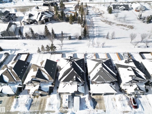 Snowy aerial view with a residential view - 56 Durrand Bend, Fort Saskatchewan, AB - Outdoor With View