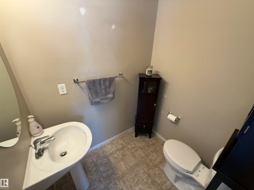 Bathroom with tile patterned floors and toilet - 19 2021 Grantham Crest, Edmonton, AB - Indoor Photo Showing Bathroom
