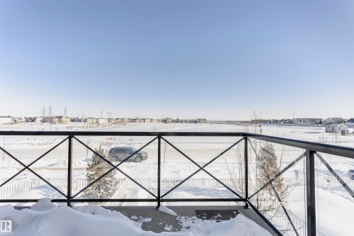 Snow covered patio with a balcony - 2412 192 Street, Edmonton, AB - Outdoor With Balcony With View