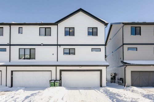 Snow covered property with an attached garage - 2412 192 Street, Edmonton, AB - Outdoor