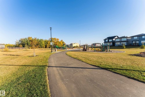 View of street featuring street lighting and a residential view - 2412 192 Street, Edmonton, AB - Outdoor With View