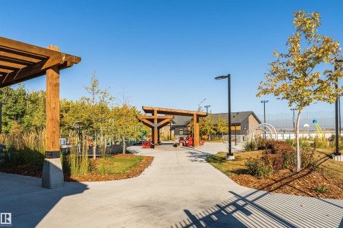 Surrounding community with a pergola, a playground, and a patio - 2412 192 Street, Edmonton, AB - Outdoor