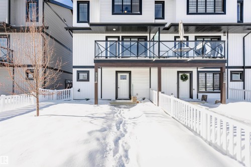 View of snow covered back of property - 2412 192 Street, Edmonton, AB - Outdoor With Balcony With Facade