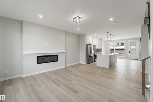 9145 154 Street, Edmonton, AB - Indoor Photo Showing Living Room With Fireplace