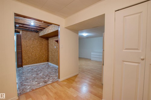 Hallway featuring light wood finished floors and baseboards - 9907 165 Street, Edmonton, AB - Indoor Photo Showing Other Room