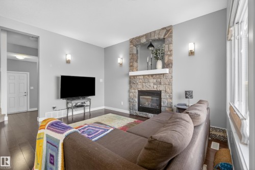 90 Hilldowns Drive, Spruce Grove, AB - Indoor Photo Showing Living Room With Fireplace