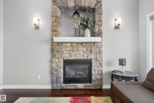 90 Hilldowns Drive, Spruce Grove, AB - Indoor Photo Showing Living Room With Fireplace