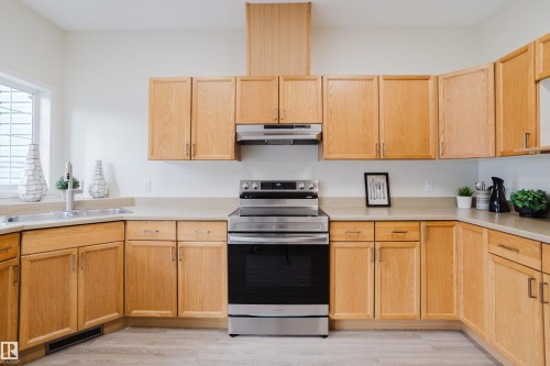 42 1780 Glastonbury Boulevard, Edmonton, AB - Indoor Photo Showing Kitchen With Double Sink