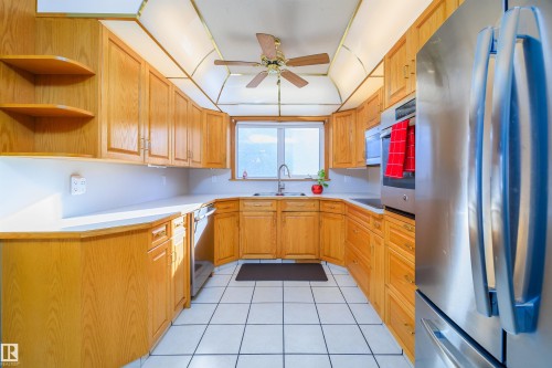 6931 14 Avenue, Edmonton, AB - Indoor Photo Showing Kitchen With Double Sink