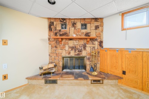 6931 14 Avenue, Edmonton, AB - Indoor With Fireplace