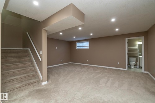 Below grade area featuring light carpet and recessed lighting - 16454 61A Street, Edmonton, AB - Indoor Photo Showing Other Room