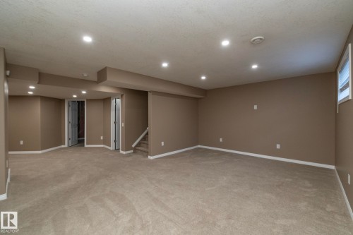 Finished basement featuring recessed lighting and light carpet - 16454 61A Street, Edmonton, AB - Indoor