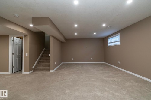 Basement with light colored carpet and recessed lighting - 16454 61A Street, Edmonton, AB - Indoor Photo Showing Basement