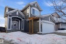 View of front of house with entry steps - 12634 16A Avenue, Edmonton, AB  - Outdoor With Facade 
