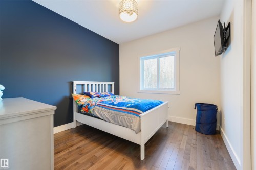14 2406 Twp Road 540, Rural Lac Ste. Anne County, AB - Indoor Photo Showing Bedroom