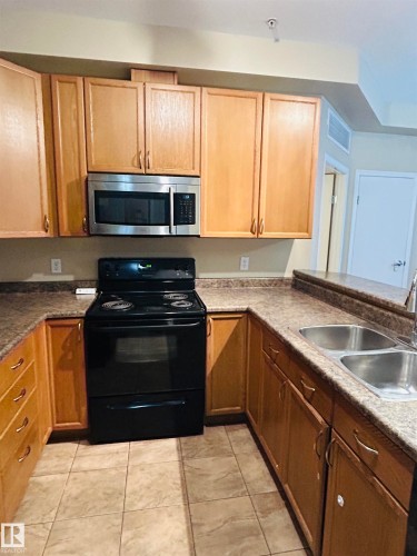 214 4304 139 Avenue, Edmonton, AB - Indoor Photo Showing Kitchen With Double Sink