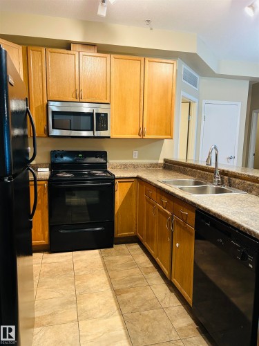 214 4304 139 Avenue, Edmonton, AB - Indoor Photo Showing Kitchen With Double Sink