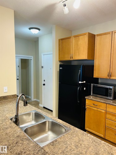 214 4304 139 Avenue, Edmonton, AB - Indoor Photo Showing Kitchen With Double Sink