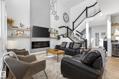 153 Henderson Link, Spruce Grove, AB - Indoor Photo Showing Living Room With Fireplace