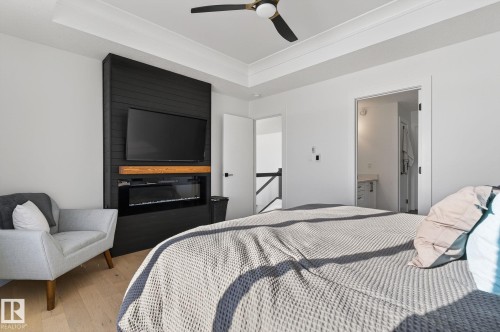 153 Henderson Link, Spruce Grove, AB - Indoor Photo Showing Other Room With Fireplace