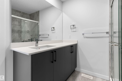 Full bath with vanity and a shower stall - 320 Munn Way, Leduc, AB - Indoor Photo Showing Bathroom