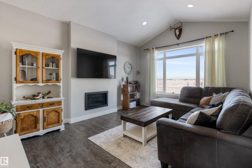 10613 96 Street, Morinville, AB - Indoor Photo Showing Living Room With Fireplace