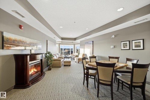 3 35 Sturgeon Road, St. Albert, AB - Indoor Photo Showing Dining Room With Fireplace