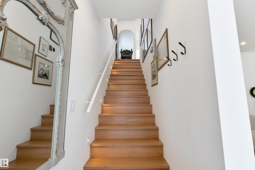 Hardwood on the stairs going upstairs - 7707 79 Avenue, Edmonton, AB - Indoor Photo Showing Other Room