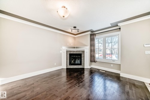 10711 70 Avenue, Edmonton, AB - Indoor Photo Showing Living Room With Fireplace