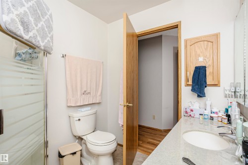 Full bath featuring vanity and a shower stall - 408 10935 21 Avenue, Edmonton, AB - Indoor Photo Showing Bathroom