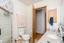 Full bath featuring vanity and a shower stall - 