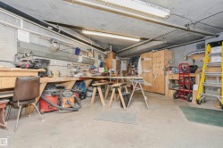 Garage featuring a workshop area - 