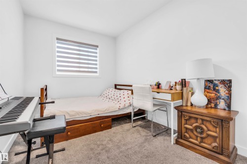 Unit 9 1910 Collip View Sw Sw, Edmonton, AB - Indoor Photo Showing Bedroom