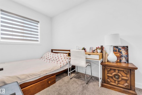 Unit 9 1910 Collip View Sw Sw, Edmonton, AB - Indoor Photo Showing Bedroom