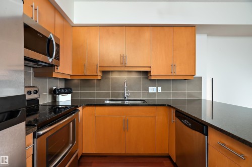 1004 10303 111 Street, Edmonton, AB - Indoor Photo Showing Kitchen With Stainless Steel Kitchen With Double Sink