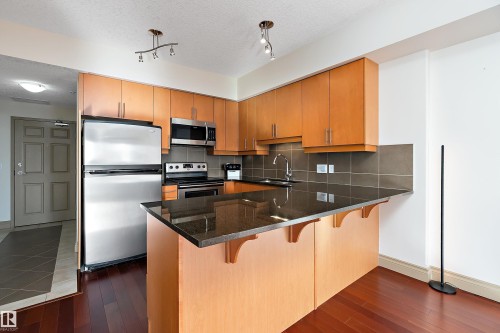1004 10303 111 Street, Edmonton, AB - Indoor Photo Showing Kitchen With Stainless Steel Kitchen With Double Sink