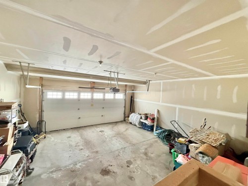 Garage featuring a garage door opener - 1019 174 Street, Edmonton, AB - Indoor Photo Showing Garage