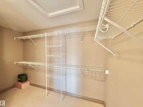 View of walk in closet - 1019 174 Street, Edmonton, AB - Indoor With Storage