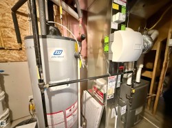 Utilities featuring water heater and heating unit - 