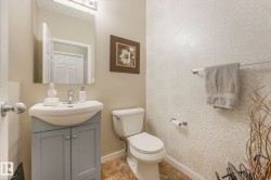 Half bath with vanity and toilet - 