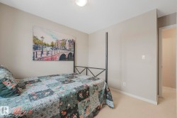 Carpeted bedroom with baseboards - 