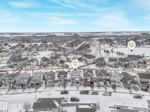 Snowy aerial view with a residential view - 281 Southwick Way, Leduc, AB - Outdoor With View