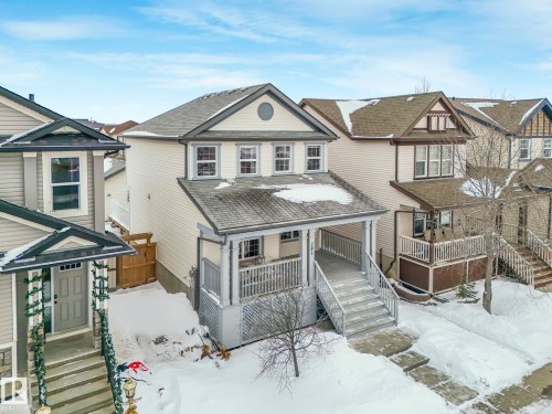 View of front of house featuring roof with shingles and a wooden deck - 281 Southwick Way, Leduc, AB - Outdoor With Deck Patio Veranda With Facade