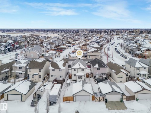 Snowy aerial view with a residential view - 281 Southwick Way, Leduc, AB - Outdoor With View