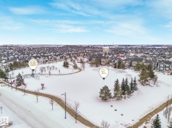 Snowy aerial view featuring a residential view - 