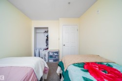 Bedroom featuring carpet floors and a closet - 
