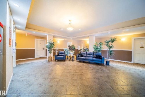 Common area with recessed lighting and a raised ceiling - 211 4310 33 Street, Stony Plain, AB - Indoor