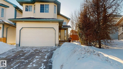 View of front of property with a garage and driveway - 17010 84 Street, Edmonton, AB - Outdoor